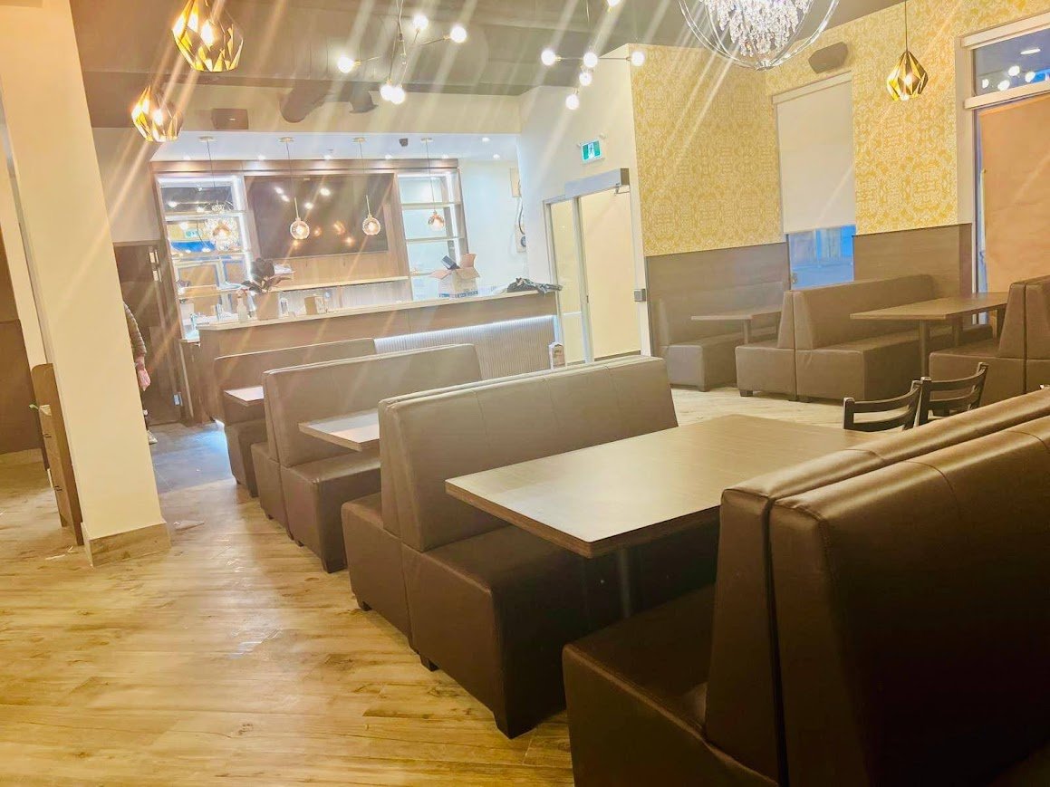 Booth seating inside Saffron Indian & Hakka Cuisine in Cambridge